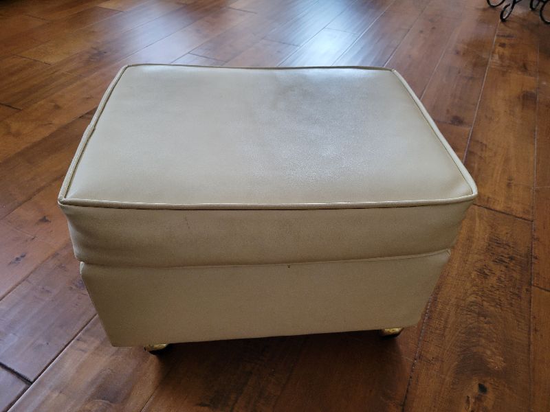 Photo 2 of CREME COLORED FOOT REST WITH WHEELS 21” X 16” H 15”