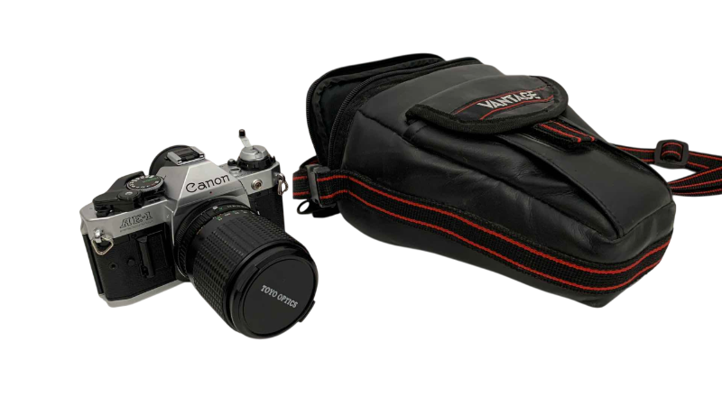 Photo 1 of VINTAGE CANON AE-1 CAMERA AND CASE