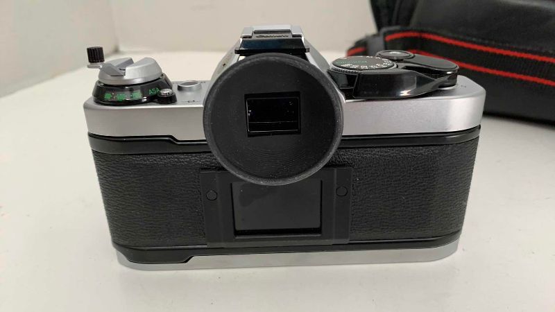 Photo 1 of VINTAGE CANON AE-1 CAMERA AND CASE
