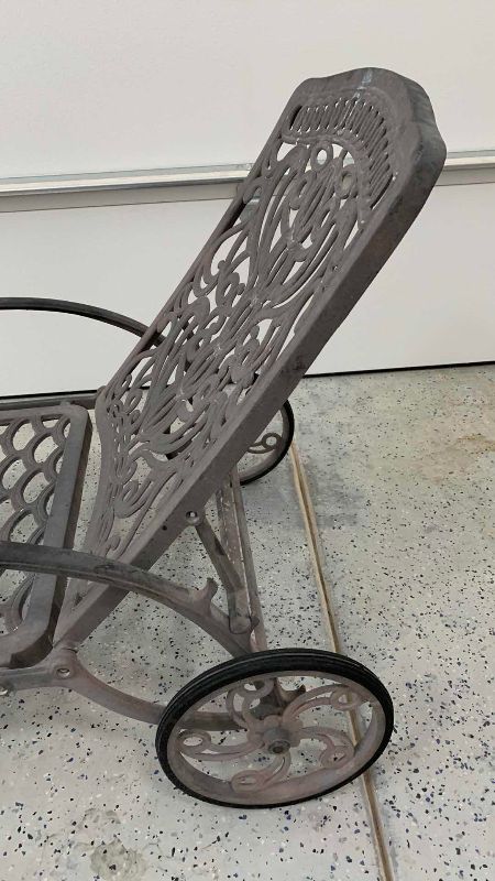 Photo 1 of METAL LOUNGE CHAIR WITH WHEELS