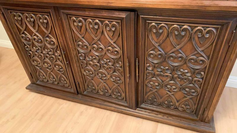 Photo 1 of CURIO CABINET WITH FILIGREE STYLE DOORS 56” X 19” H 80”