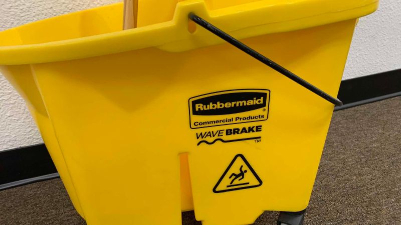 Photo 1 of RUBBERMAID COMMERCIAL PRODUCTS WAVE BREAK MOPPING BUCKET WITH WHEELS AND MOP