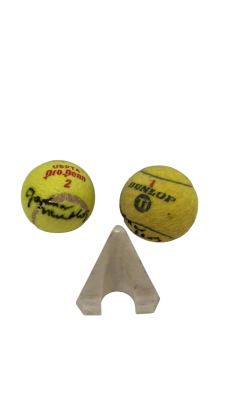 Photo 1 of TWO AUTOGRAPHED TENNIS BALLS