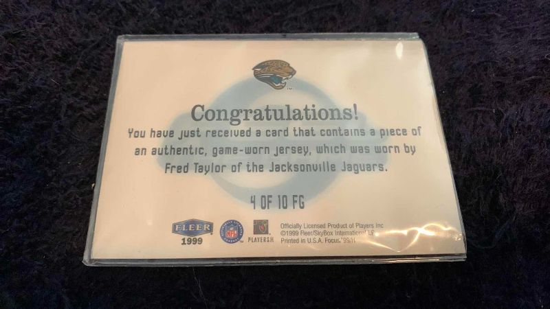 Photo 1 of 1999 NFL FOOTBALL FLEER FRED TAYLOR FEEL THE GAME JERSEY CARD