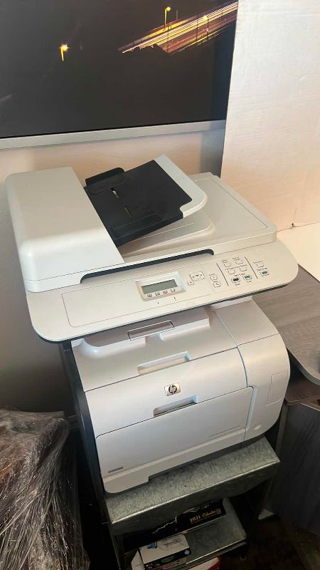 Photo 1 of HP COLOR LASERJET CM2320N MFP PRINTER
