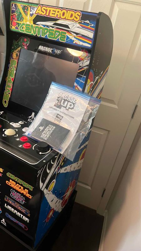 Photo 1 of ARCADE 1UP ATARI CLASSICS STAND UP ARCADE GAME: ASTEROIDS, CENTIPEDE, MISSLE COMMAND, LUNAR LANDER, TEMPEST, AND MORE 19” X 23” H 59”