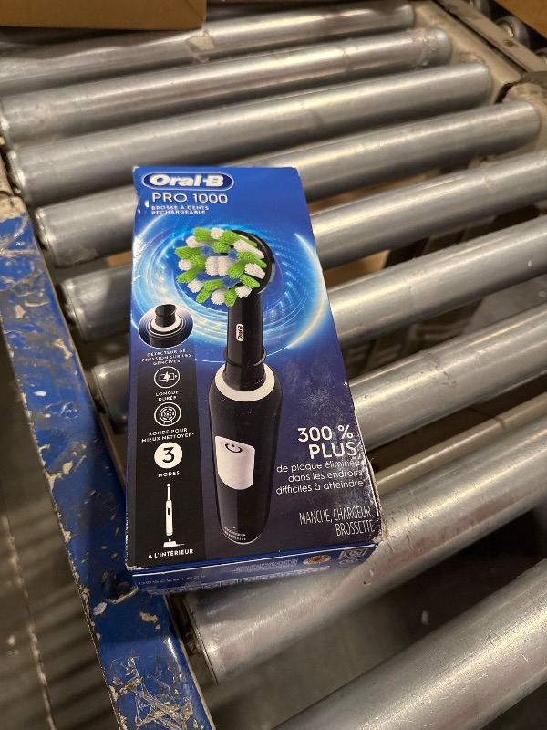 Photo 2 of 1000 CrossAction Electric Toothbrush