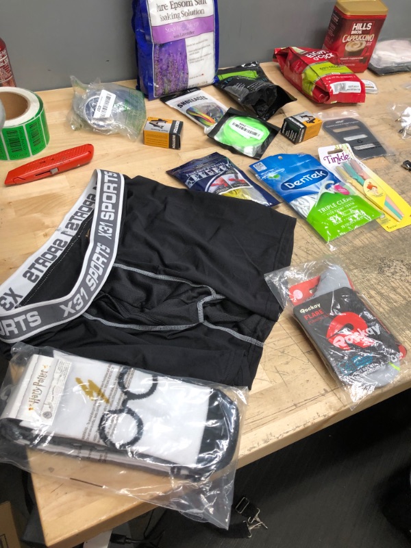 Photo 5 of ***NON-REFUNDABLE***
ASSORTED GOODS 
HARRY POTTER SOCKS, MENS MEDIUM BOXER BREIFS, PAIR OF ROCKAY RUNNING SOCKS,FLOSS PICKS,EYEBROW RAZORS,STAPLER REMOVER,LAVENDER EPSOM SALT, TEA TREE OIL FOOT SOAK,COFFEE,CAPPUCCINO MIX, FACE MASK,SHOELACES, WATCH STRAP,