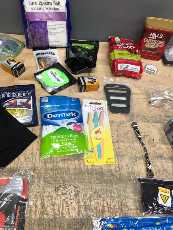 Photo 3 of ***NON-REFUNDABLE***
ASSORTED GOODS 
HARRY POTTER SOCKS, MENS MEDIUM BOXER BREIFS, PAIR OF ROCKAY RUNNING SOCKS,FLOSS PICKS,EYEBROW RAZORS,STAPLER REMOVER,LAVENDER EPSOM SALT, TEA TREE OIL FOOT SOAK,COFFEE,CAPPUCCINO MIX, FACE MASK,SHOELACES, WATCH STRAP,