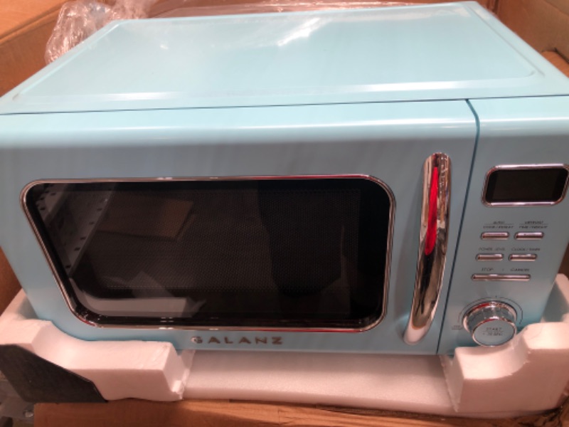 Photo 2 of Galanz 1.1 Cu. Ft. Retro Countertop Microwave in Blue
