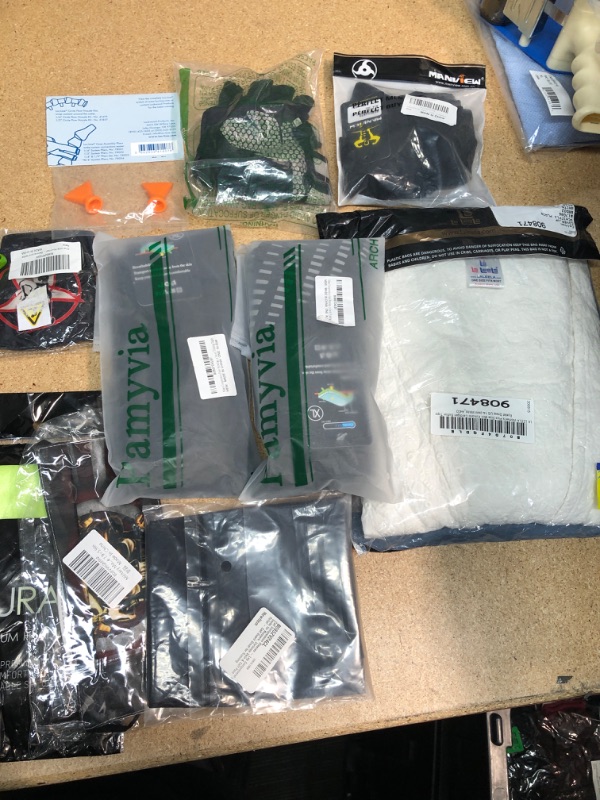 Photo 1 of **NO REFUNDS/RETURNS**- Bundle of Assorted CLOTHES: SOCKS, GLOVES, SHIRT, SMALL- XL 