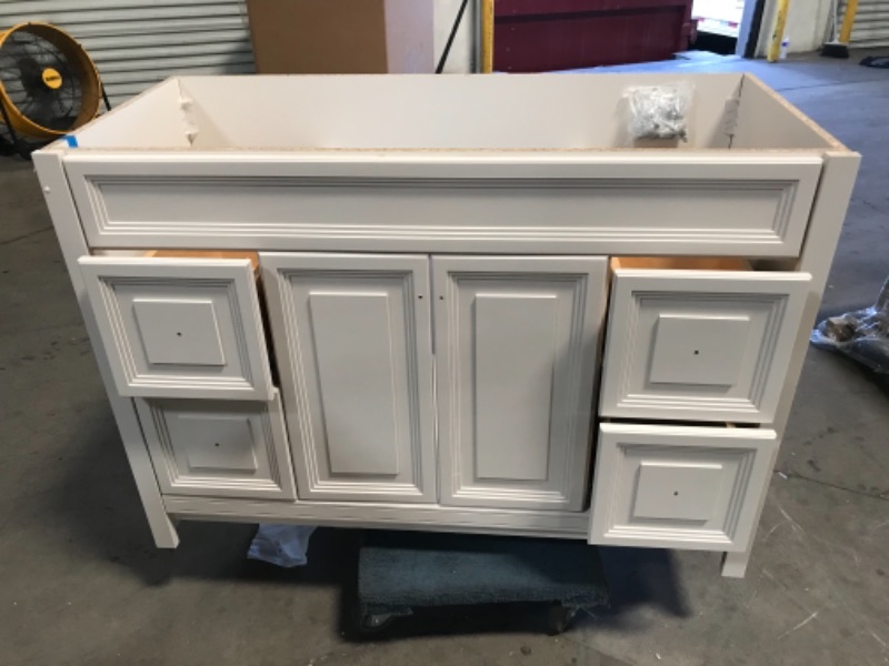 Photo 2 of (2 FRONT DOORS DO NOT SYMETRICALLY OPEN)
Home Decorators Collection Brinkhill 48 in. W x 34 in. H x 22 in. D Bath Vanity Cabinet Only in Cream