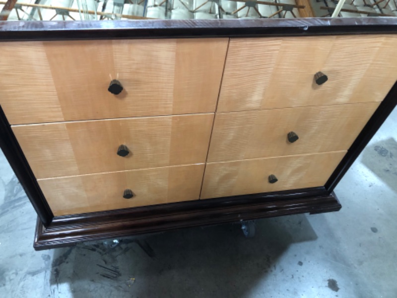 Photo 1 of Brown and gold mirror top 6 drawer dresser
48W x 16D x 36H