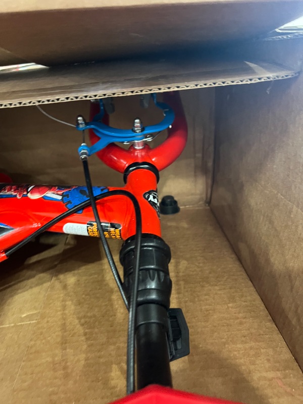 Photo 4 of Huffy Marvel Spider-Man 12” Kid’s Bike with Training Wheels, Quick Connect Assembly, Red
