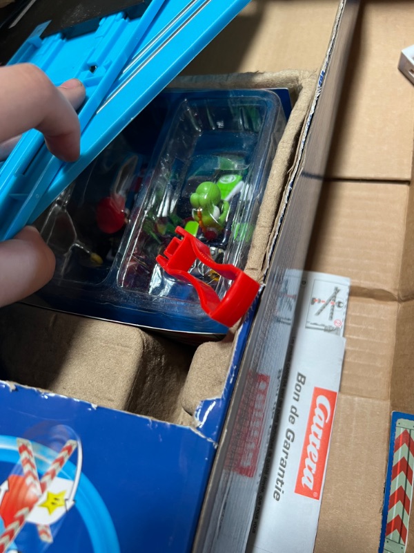 Photo 5 of Carrera First Mario Kart - Slot Car Race Track With Spinners - Includes 2 Cars: Mario and Yoshi - Battery-Powered Beginner Racing Set for Kids Ages 3 Years and Up
