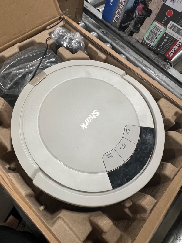 Photo 2 of Shark AV752 ION Robot Vacuum, with Tri-Brush System, Wi-Fi Connected, 120min Runtime, Works with Alexa, Multi-Surface Cleaning, White
