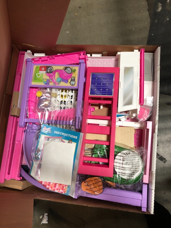 Photo 2 of Barbie Dreamhouse Dollhouse with Wheelchair Accessible Elevator, Pool, Slide and 70 Accessories Including Furniture and Household Items, Gift for 3 to 7 Year Olds
