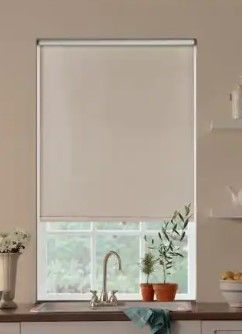 Photo 1 of Bali Cut-to-Size Cut-to-Size Cream Cordless Blackout Fade resistant Roller Shades 23.5 in. W x 72 in. L