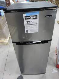 Photo 1 of DENTED**
MAGIC CHEF 2-DOOR MINI REFRIGERATOR