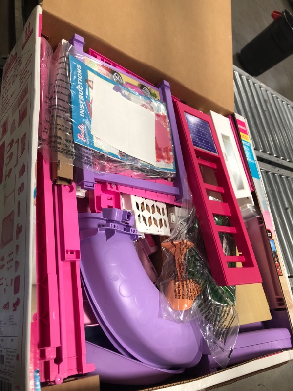 Photo 3 of Barbie Dreamhouse Dollhouse with Wheelchair Accessible Elevator, Pool, Slide and 70 Accessories Including Furniture and Household Items, Gift for 3 to 7 Year Olds
