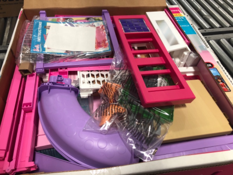 Photo 2 of Barbie Dreamhouse Dollhouse with Wheelchair Accessible Elevator, Pool, Slide and 70 Accessories Including Furniture and Household Items, Gift for 3 to 7 Year Olds
