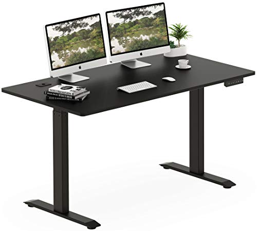 Photo 1 of SHW 55-Inch Large Electric Height Adjustable Standing Desk, 55 X 28 Inches, Black
