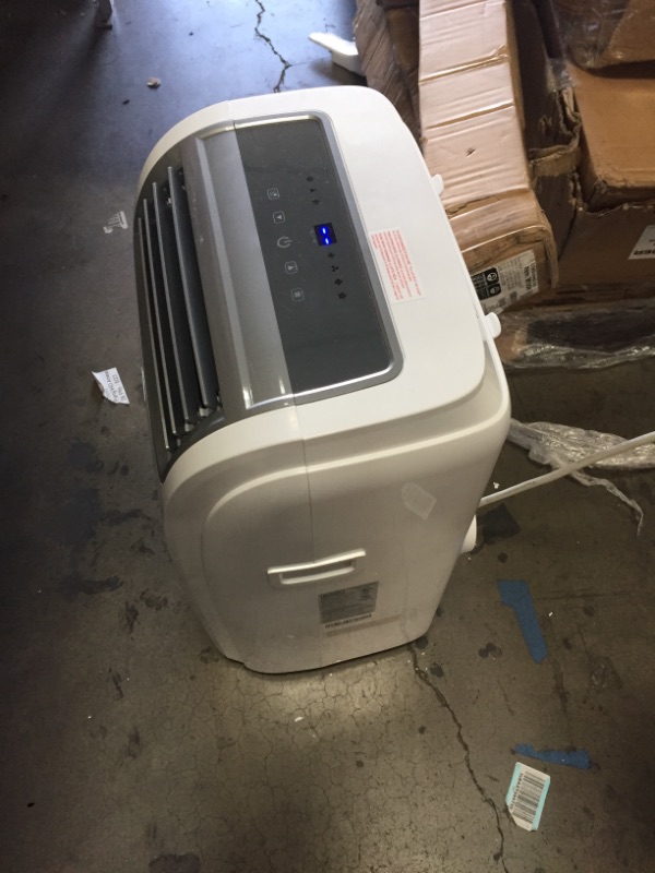 Photo 5 of TESTED POWERS ON*
BLACK+DECKER 14,000 BTU Portable Air Conditioner with Remote Control, White
