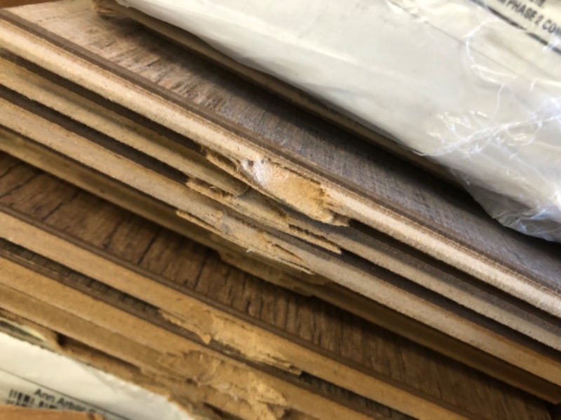 Photo 3 of (SOME DAMAGED ENDS)
TrafficMaster Ann Arbor Oak 8 mm Thick x 6-1/8 in. Wide x 47-5/8 in. Length Laminate Flooring (20.32 sq. ft. / case), 39 cases