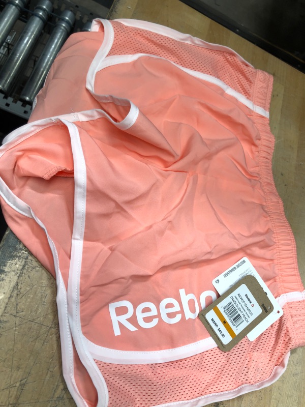 Photo 2 of CANDLE LIGHT PEACH REEBOK WOMEN TRAINING SHORTS- MEDIUM 