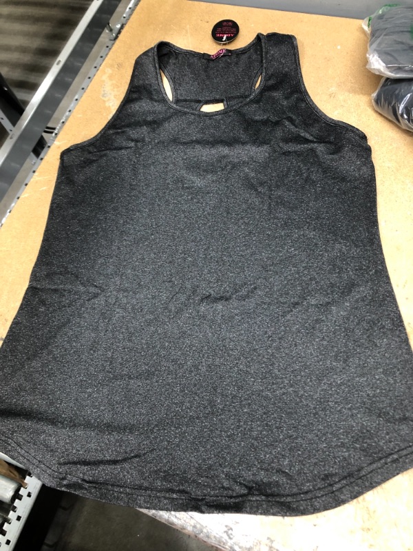 Photo 2 of Adome size M workout top grey