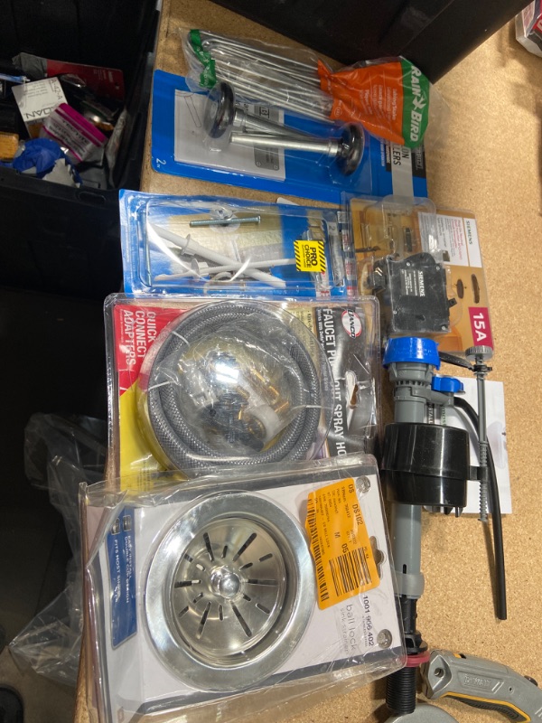 Photo 1 of **NO REFUNDS/RETURNS** -Bundle Of miscellaneous home depot goods for home, replacement supplies, sink strainer, etc. 