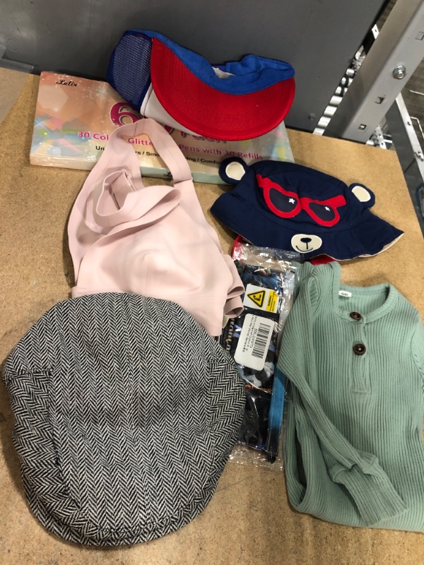 Photo 1 of ASSORTED ITEMS, 2 HATS FOR ADULTS, 1 BUCKET HAT KIDS SIZE, MULTI COLOR PEN SET  AND MORE 