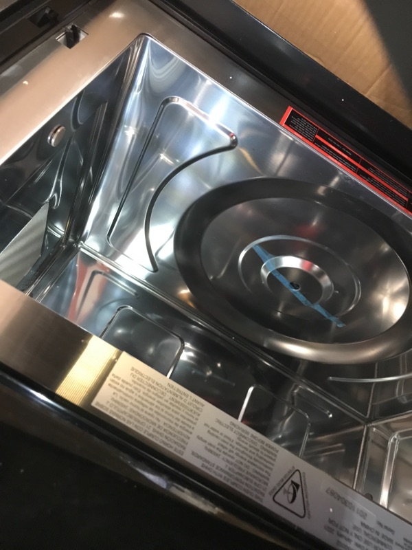 Photo 1 of 1.7 cu. ft. Over the Range Microwave in Stainless Steel with Air Fry, Sensor Cooking, Grill
