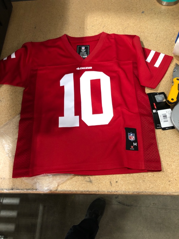 Photo 2 of 49ers nfl red shirt number 10 
SIZE: 5/6 Kids