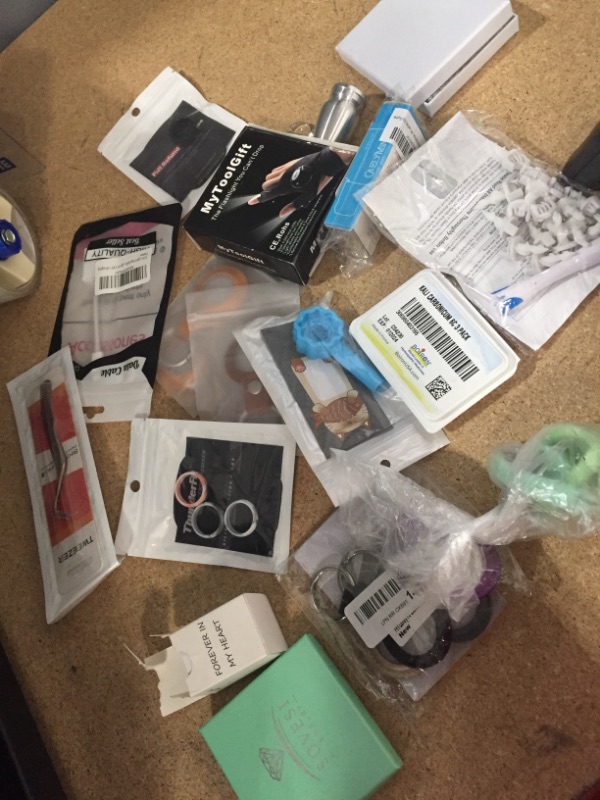 Photo 1 of **NOT REFUNDABLE** BUNDLE OF ASSORTED MISC ITEMS ( EARRINGS, AIRTAG CASES, RINGS ETC..)