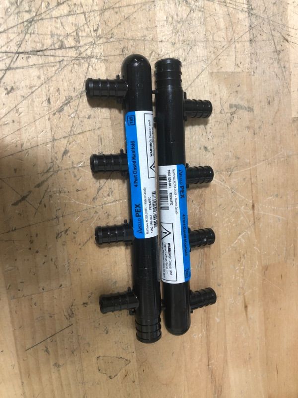Photo 1 of ** SETS OF 2**
3/4 in. Barb Inlets x 1/2 in. Barb 4-Port PEX Closed Plastic Manifold