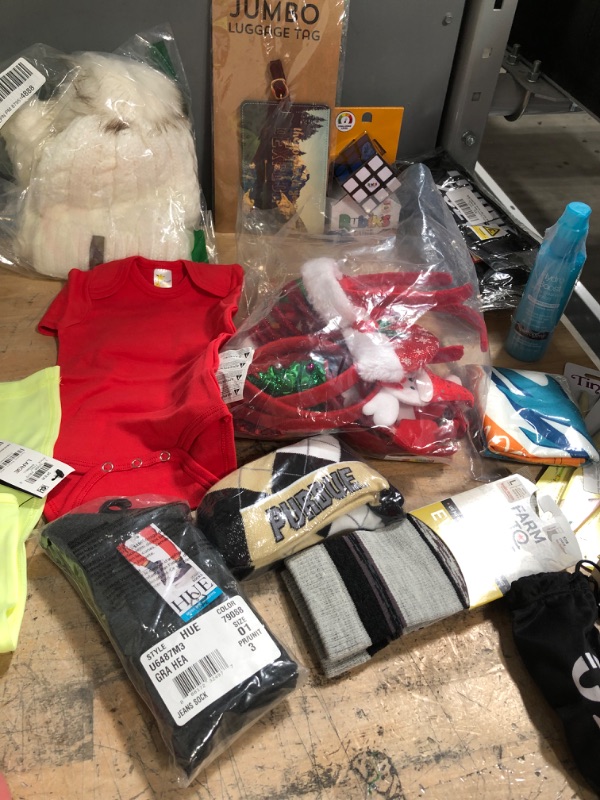 Photo 4 of ***NON-REFUNDABLE***
XL ONE BOXER BRIEF,  LARGE LADIES TANK, RUBIX CUBE, FACE LOTION, EYEBROW CUTTERS, KIDS FLIP FLOPS SIZE 7T,8 FACE MASKS, 3 PACKS OF SOCKS, SOAP, EYE LINER