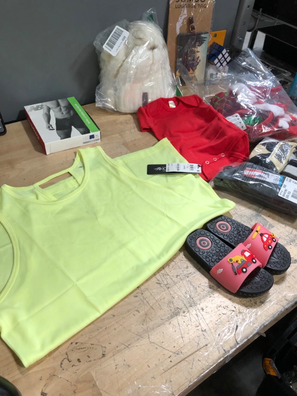 Photo 5 of ***NON-REFUNDABLE***
XL ONE BOXER BRIEF,  LARGE LADIES TANK, RUBIX CUBE, FACE LOTION, EYEBROW CUTTERS, KIDS FLIP FLOPS SIZE 7T,8 FACE MASKS, 3 PACKS OF SOCKS, SOAP, EYE LINER