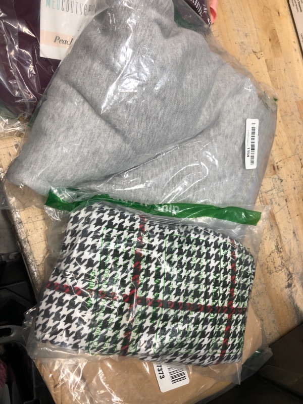 Photo 1 of ASSORTMENT OF WOMEN'S CLOTHES, & SOCKS **SOLD AS SET**