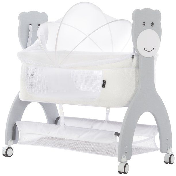 Photo 1 of Dream On Me Cub Portable Bassinet, Rocking Cradle, Best for small living space, Compact Portable Bassinet in White
