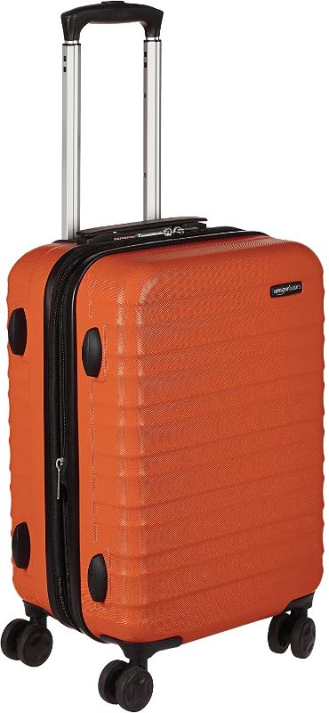 Photo 1 of Amazon Basics 21-Inch Hardside Spinner, Orange
