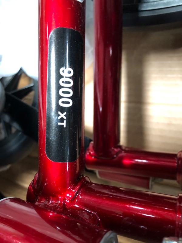 Photo 5 of Invacare 9000 XT High Performance Lighter Weight Wheelchair, with Desk Length Arms and T94HC Elevating Legrests with Padded Calf Pads, 16" Seat Width, Electric Red -ATO_9XT_WD66_61P_T94HC
