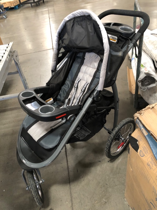 Photo 2 of Graco FastAction Fold Jogger Travel System | Includes the FastAction Fold Jogging Stroller and SnugRide 35 Infant Car Seat, Gotham