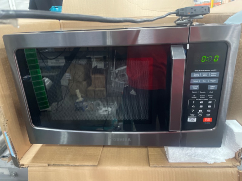 Photo 1 of Toshiba EM131A5C-BS Microwave Oven with Smart Sensor, Easy Clean Interior, ECO Mode and Sound On/Off, 1.2 Cu Ft, Black Stainless Steel
