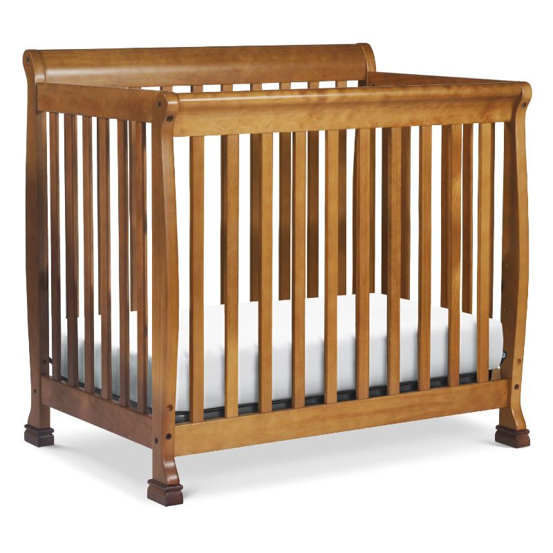 Photo 1 of DaVinci Kalani 4-in-1 Mini Crib and Twin Bed Chestnut
