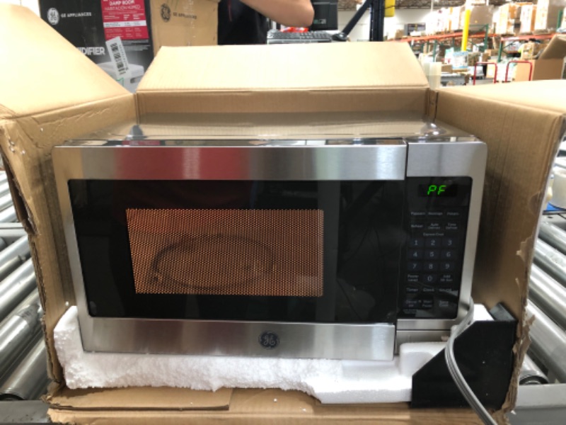 Photo 2 of GE Countertop Microwave Oven | 0.7 Cubic Feet Capacity, 700 Watts | Kitchen Essentials for the Countertop or Dorm Room | Stainless Steel
