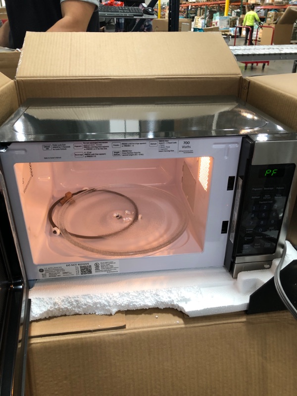 Photo 3 of GE Countertop Microwave Oven | 0.7 Cubic Feet Capacity, 700 Watts | Kitchen Essentials for the Countertop or Dorm Room | Stainless Steel
