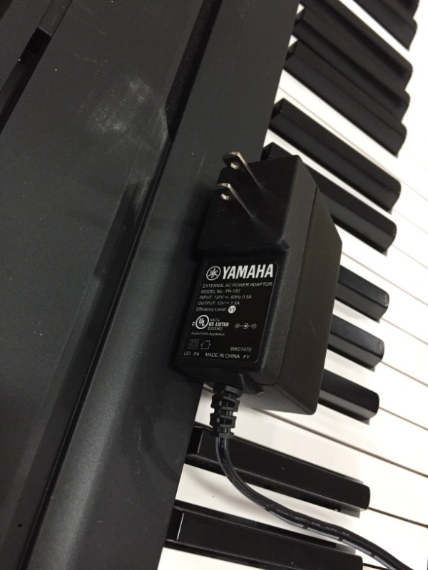 Photo 4 of **MINOR DAMAGE** YAMAHA P71 88-Key Weighted Action Digital Piano with Sustain Pedal and Power Supply (Amazon-Exclusive)
