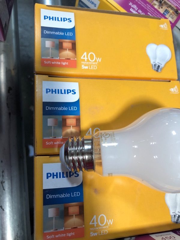 Photo 2 of **SET OF 8** Philips 40-Watt Equivalent A19 Dimmable with Warm Glow Dimming Effect Energy Saving LED Light Bulb Soft White (2700K)
