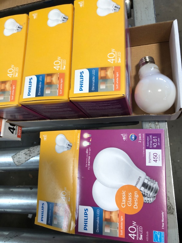 Photo 2 of **SET OF 4** Philips 40-Watt Equivalent A19 Dimmable with Warm Glow Dimming Effect Energy Saving LED Light Bulb Soft White (2700K)